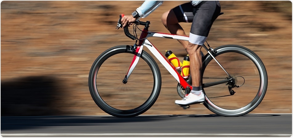 Motion blur of a bike race with the bicycle and rider at high speed