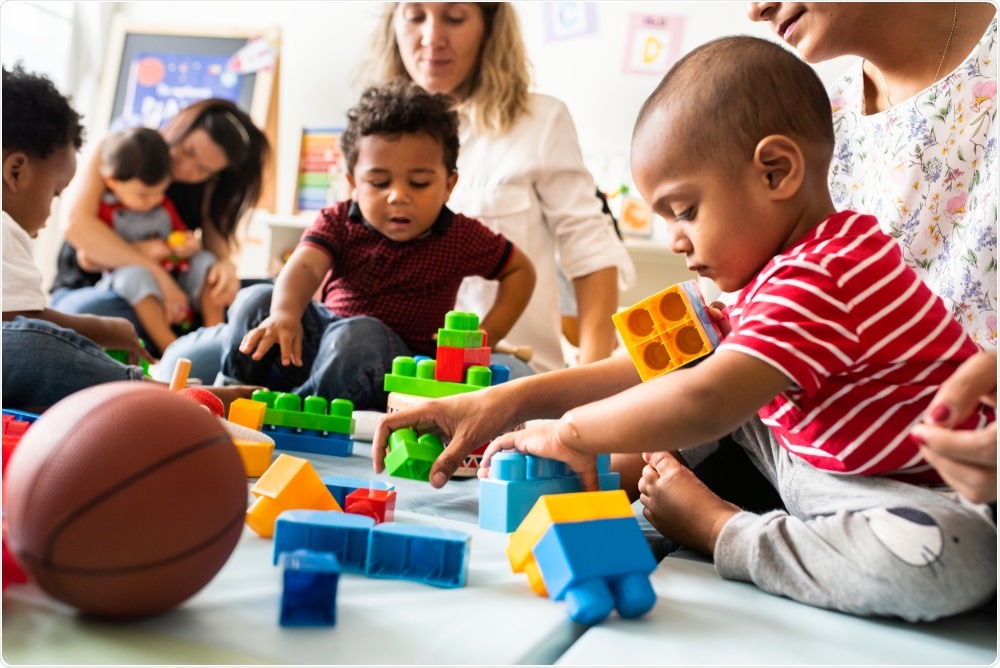 Pre-schoolers playing in classroom
