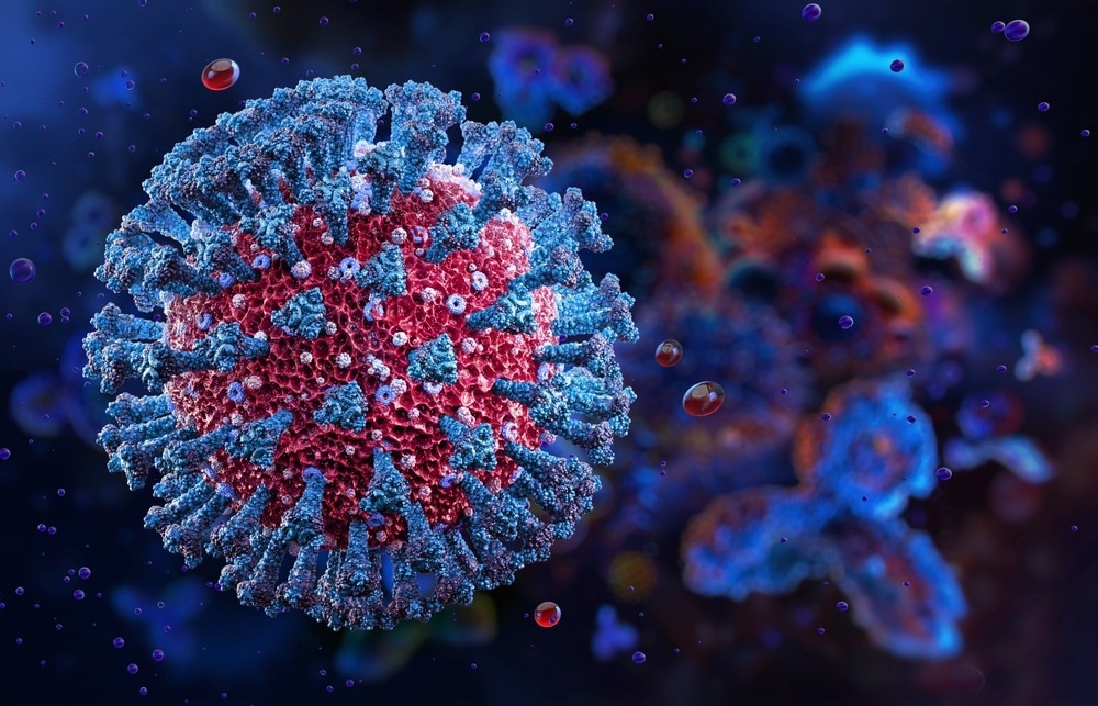A highly detailed 3D-rendered illustration of a virus particle, with a red core covered in blue spike-like protein structures. The surrounding environment is dark with floating particles, giving a microscopic view of the virus in a biological setting.